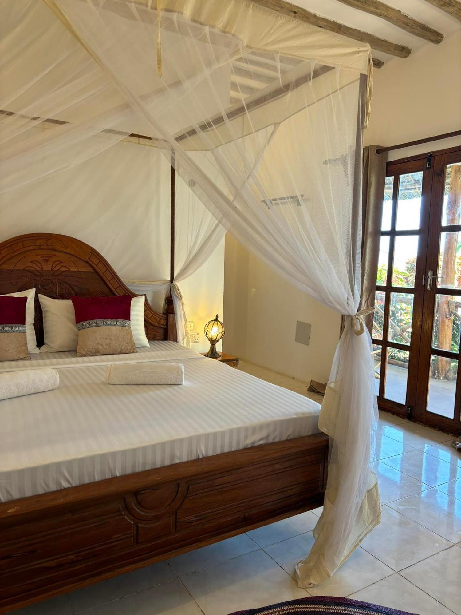 Готель Africa Dream Bungalow Kiwengwa Ківенґва Екстер'єр фото