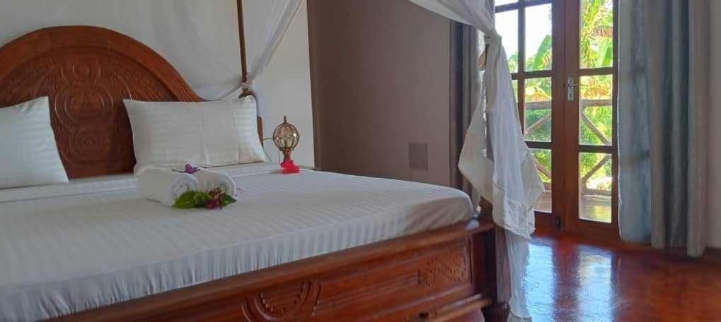 Готель Africa Dream Bungalow Kiwengwa Ківенґва Екстер'єр фото